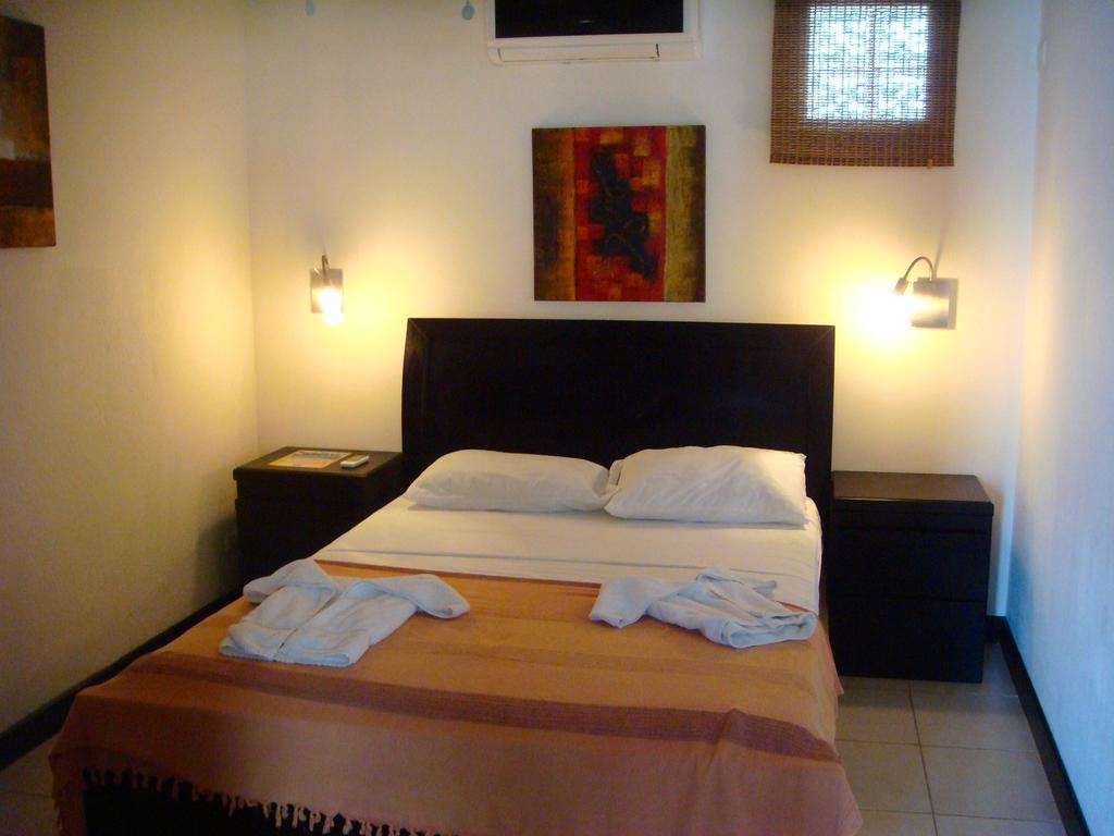 Tuanis Aparthotel Jacó Pokoj fotografie