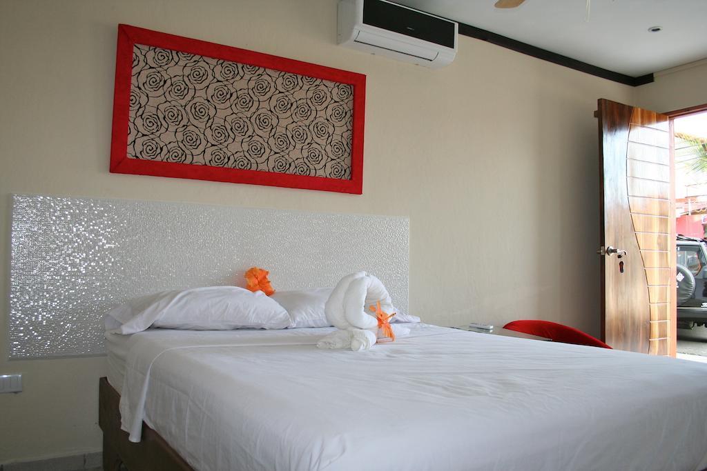 Tuanis Aparthotel Jacó Pokoj fotografie